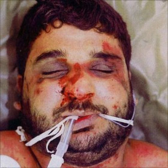 The murdered Baha Mousa, an innocent Basra civilian. Hooded, manacled, denied food and water. Ninety-three injuries. Beaten by British soldiers in 2003. Was subject to several practices banned under British law and the Geneva Convention. Legal case against government continually thwarted by authorities. One soldier eventually sentenced to one year in military custody